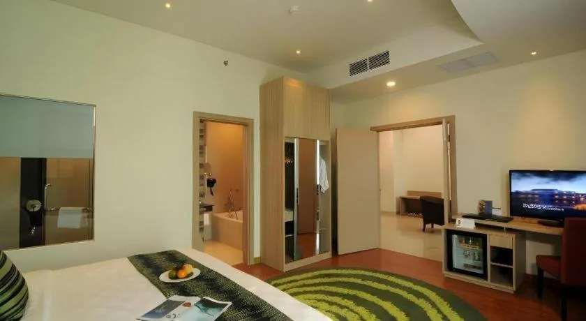 Bed in Golden Tulip Galaxy Hotel Banjarmasin