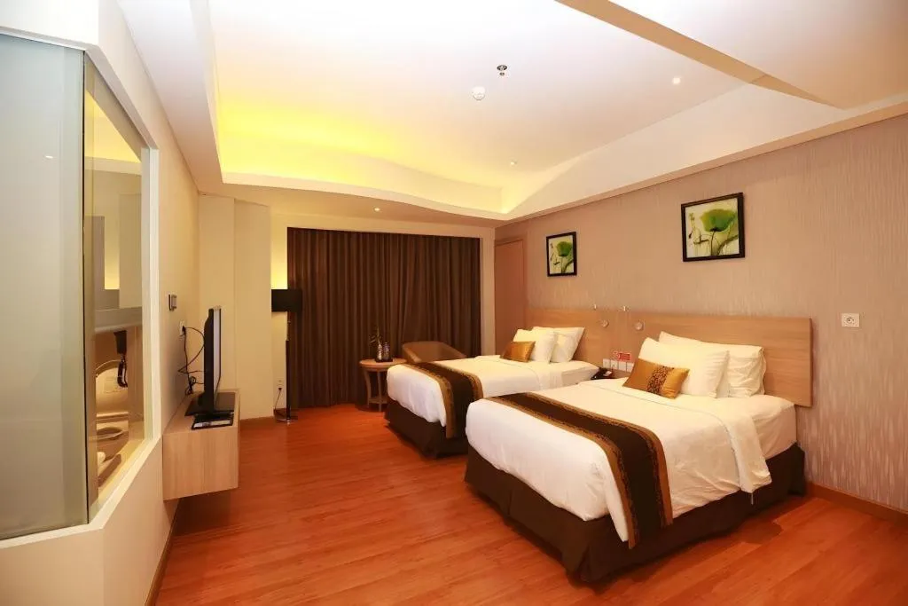 Bed in Golden Tulip Galaxy Hotel Banjarmasin