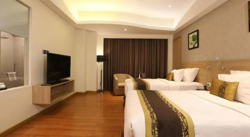 Bed in Golden Tulip Galaxy Hotel Banjarmasin