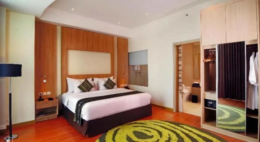 Bed in Golden Tulip Galaxy Hotel Banjarmasin