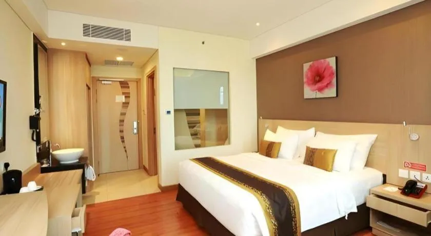 Bed in Golden Tulip Galaxy Hotel Banjarmasin