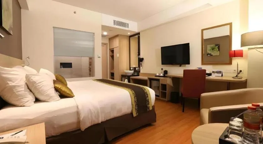 Bed in Golden Tulip Galaxy Hotel Banjarmasin