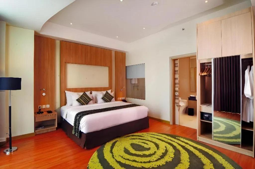 Bed in Golden Tulip Galaxy Hotel Banjarmasin