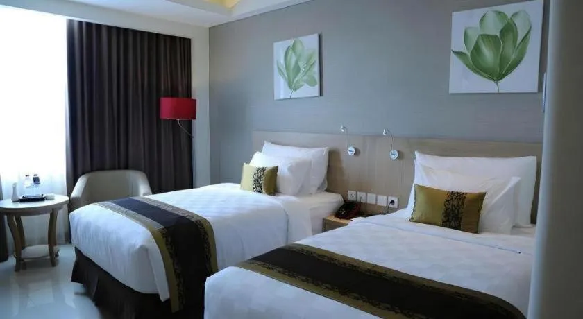 Bed in Golden Tulip Galaxy Hotel Banjarmasin