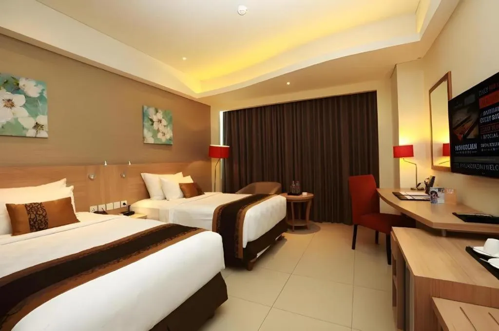 Bed in Golden Tulip Galaxy Hotel Banjarmasin