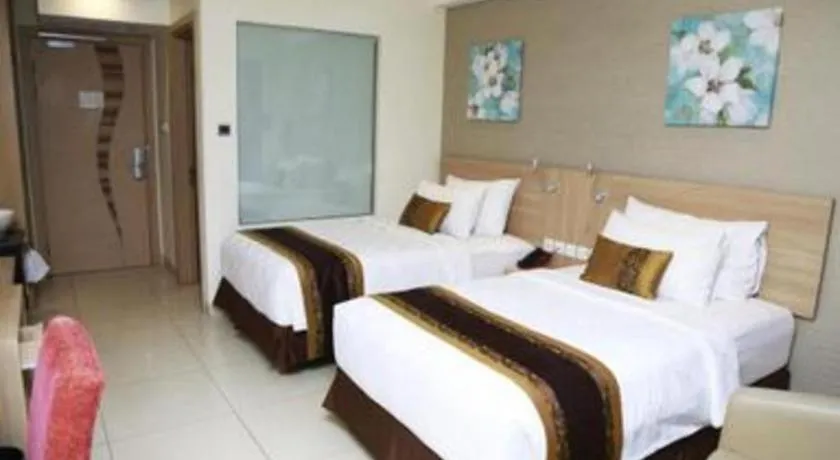 Bed in Golden Tulip Galaxy Hotel Banjarmasin