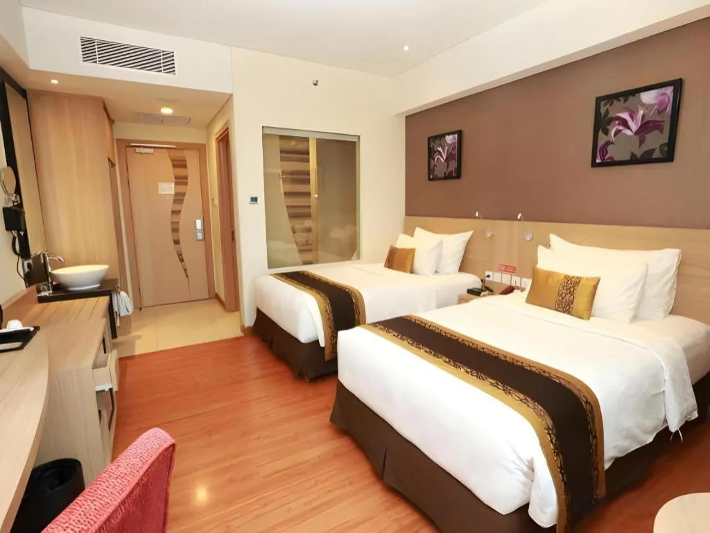 Bed in Golden Tulip Galaxy Hotel Banjarmasin