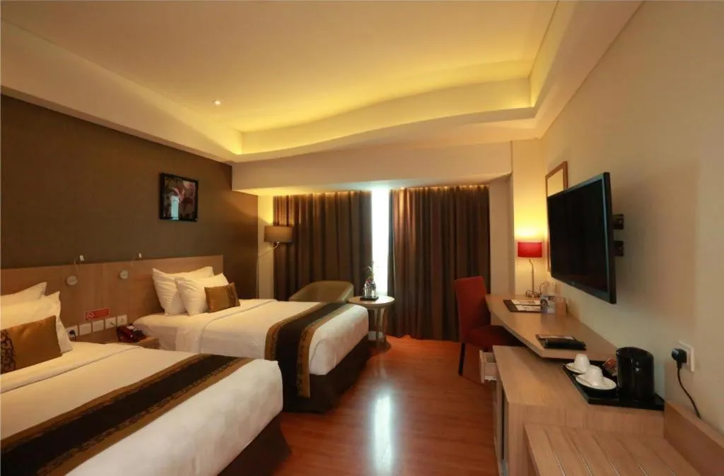 Bed in Golden Tulip Galaxy Hotel Banjarmasin