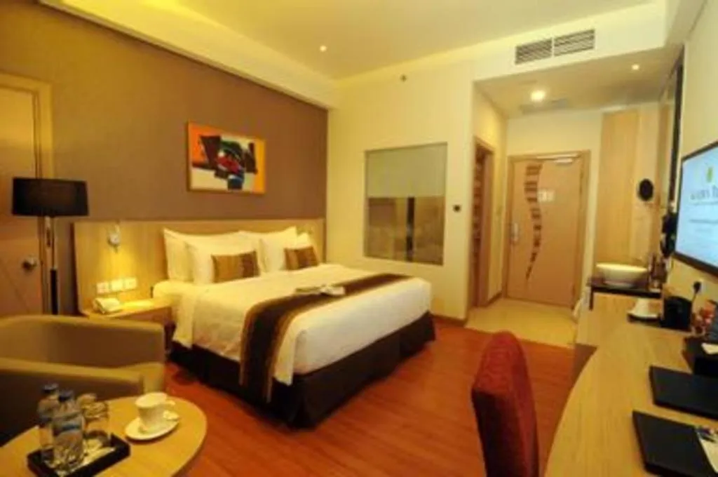 Bed in Golden Tulip Galaxy Hotel Banjarmasin