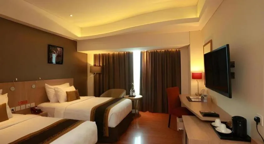 Bed in Golden Tulip Galaxy Hotel Banjarmasin