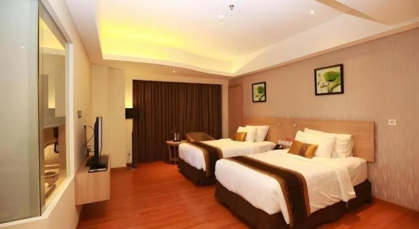 Bed in Golden Tulip Galaxy Hotel Banjarmasin