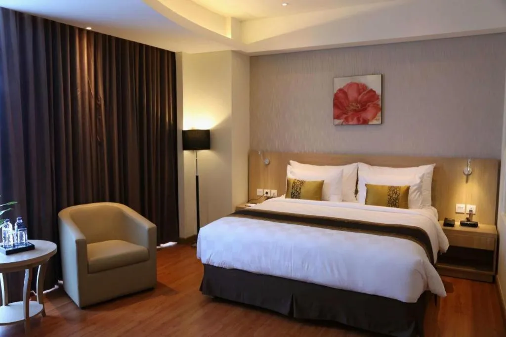 Bed in Golden Tulip Galaxy Hotel Banjarmasin