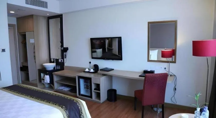 Bed in Golden Tulip Galaxy Hotel Banjarmasin