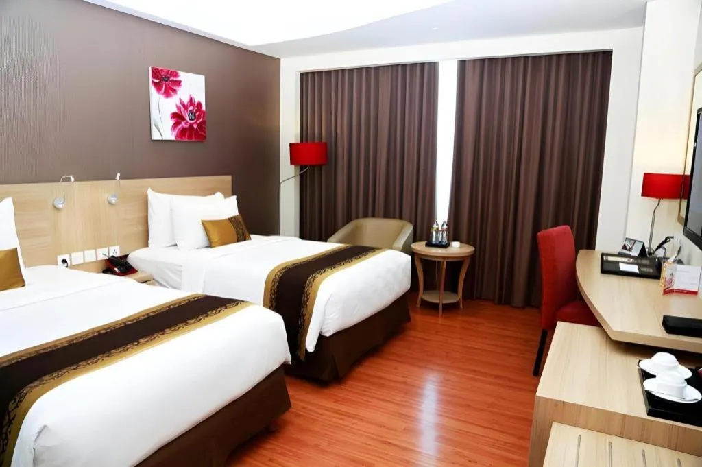 Bed in Golden Tulip Galaxy Hotel Banjarmasin