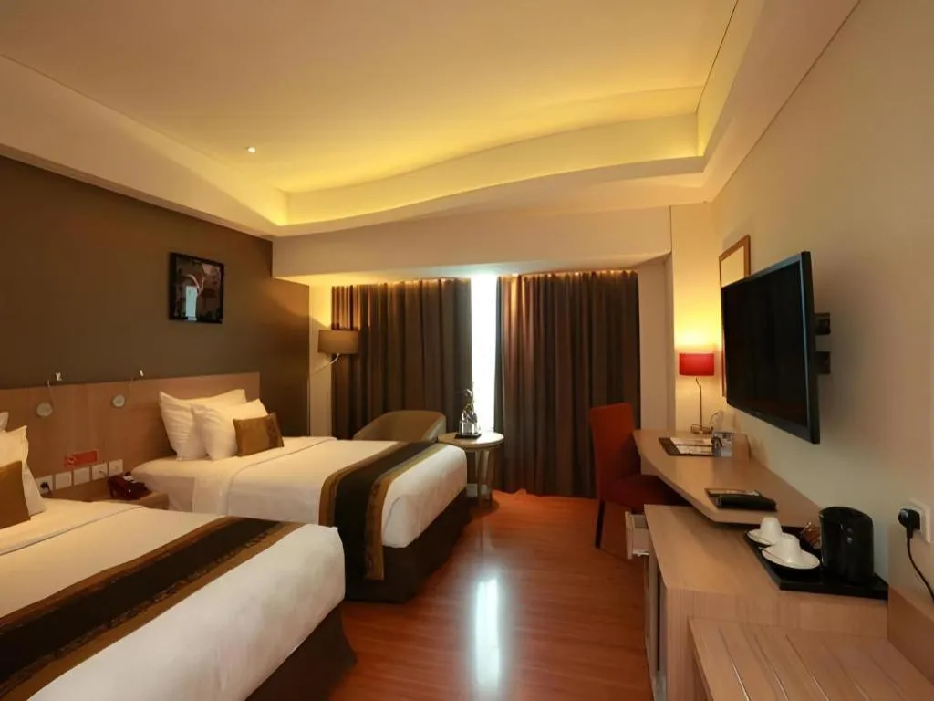 Bed in Golden Tulip Galaxy Hotel Banjarmasin