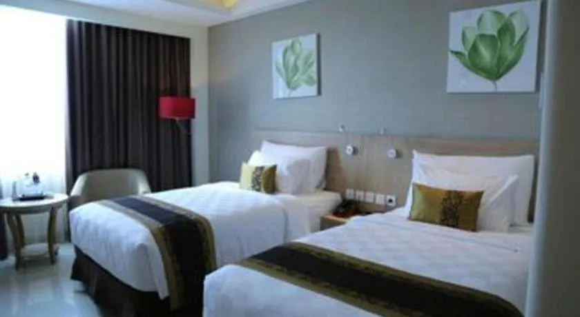 Bed in Golden Tulip Galaxy Hotel Banjarmasin