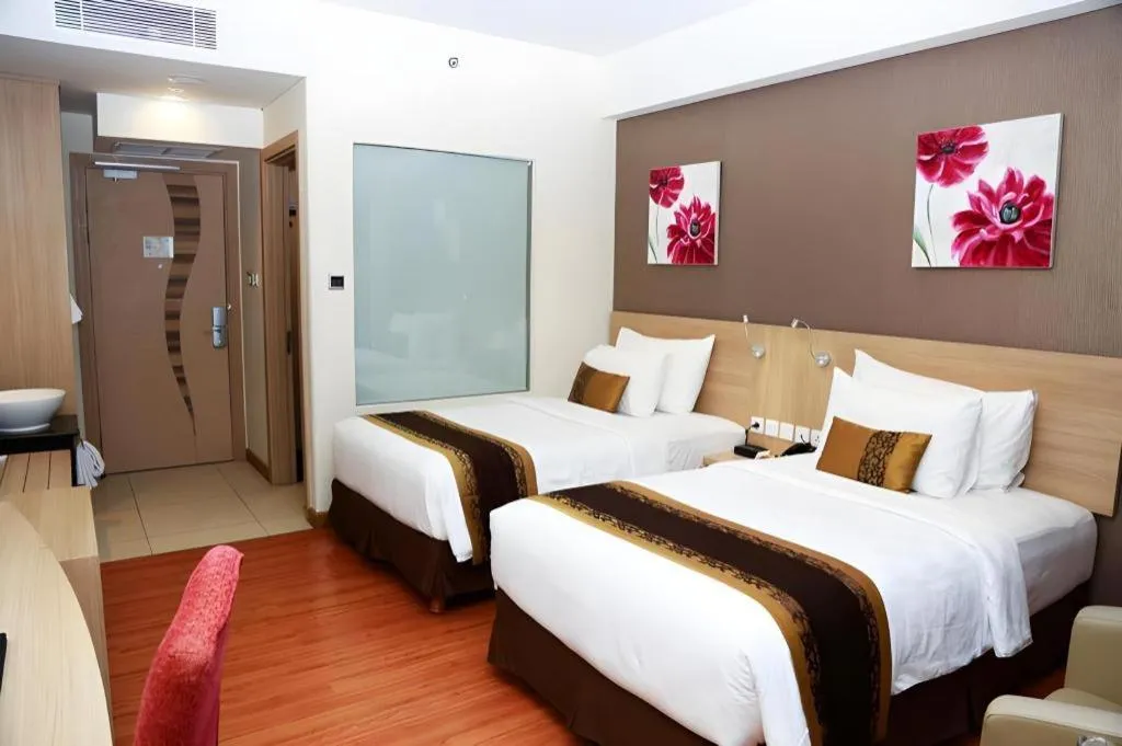 Bed in Golden Tulip Galaxy Hotel Banjarmasin