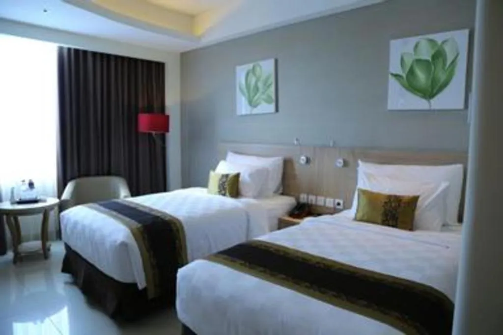Bed in Golden Tulip Galaxy Hotel Banjarmasin