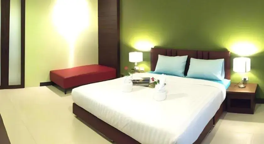 Bed in Villa Thiwa Hotel Bed in Villa Thiwa Hotel