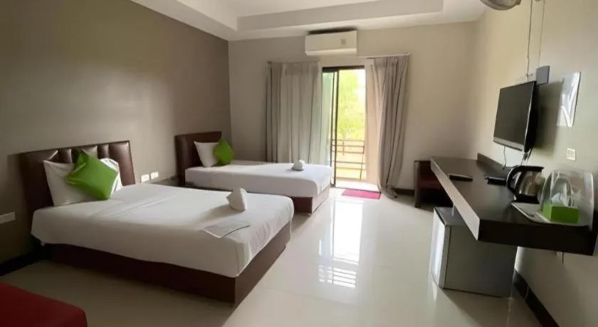 Bed in Villa Thiwa Hotel