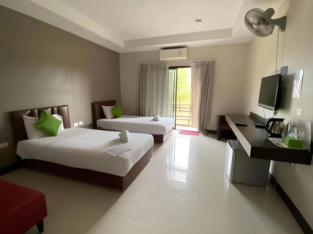 Bed in Villa Thiwa Hotel