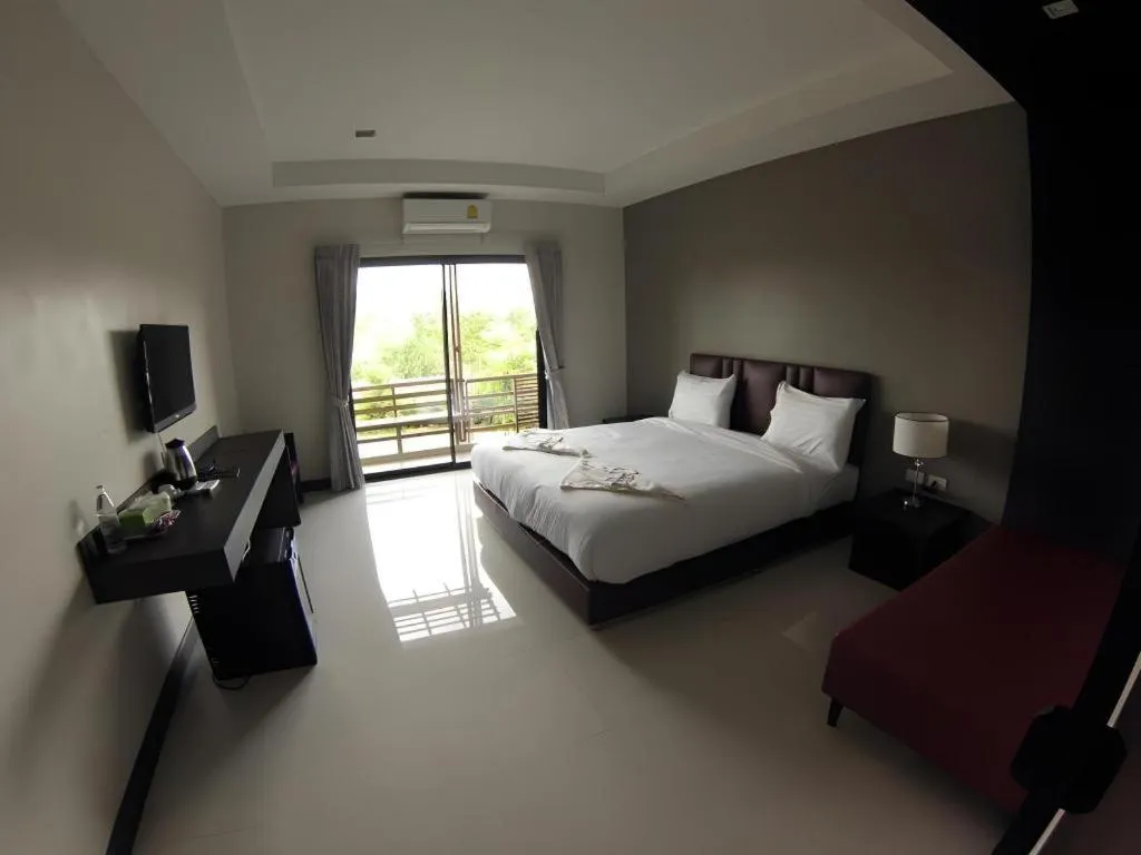 Bed in Villa Thiwa Hotel