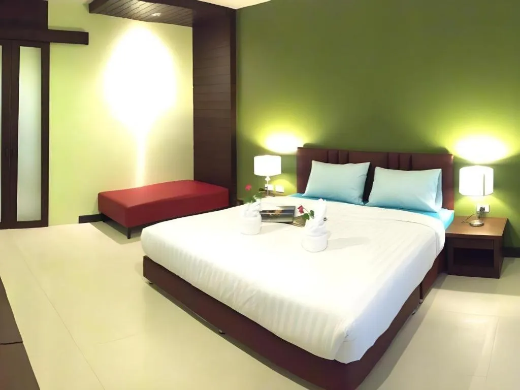 Bed in Villa Thiwa Hotel