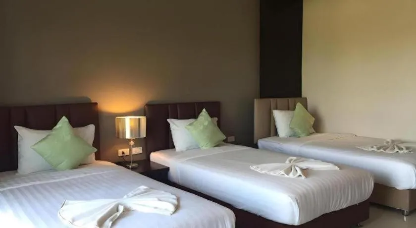 Bed in Villa Thiwa Hotel