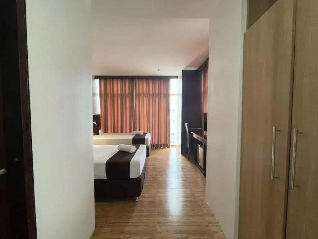 Bed in Capitol Central Hotel and Suites Bed in Capitol Central Hotel and Suites