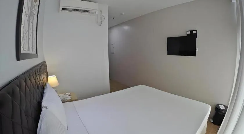 Bed in Capitol Central Hotel and Suites