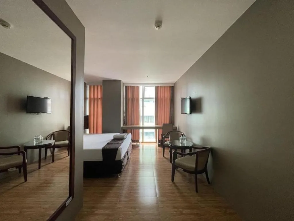 Bed in Capitol Central Hotel and Suites