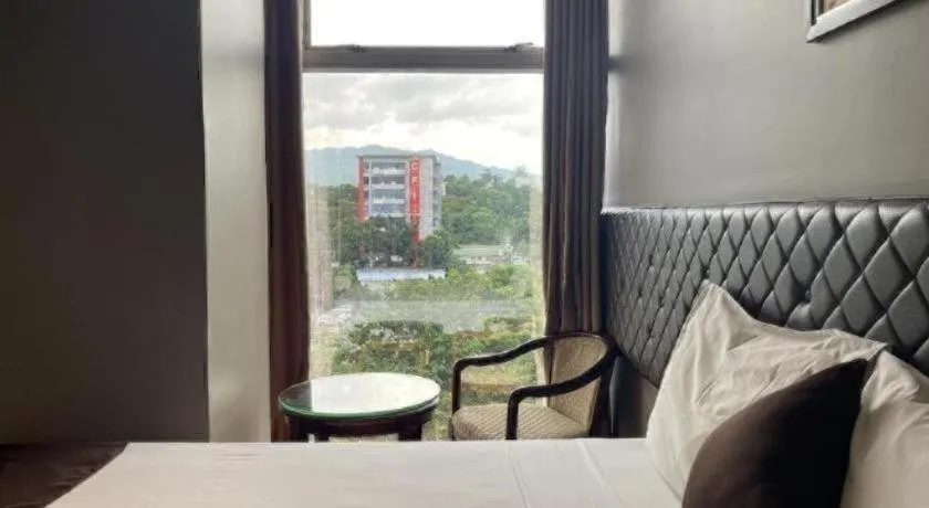 Bed in Capitol Central Hotel and Suites