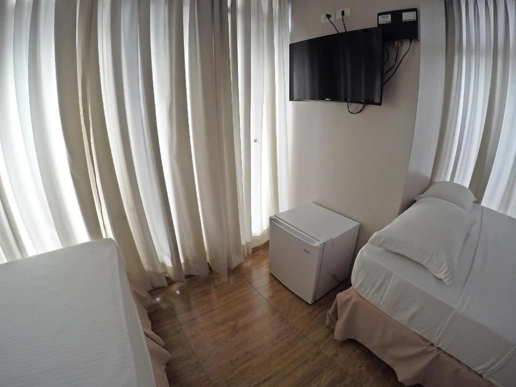 Bed in Capitol Central Hotel and Suites