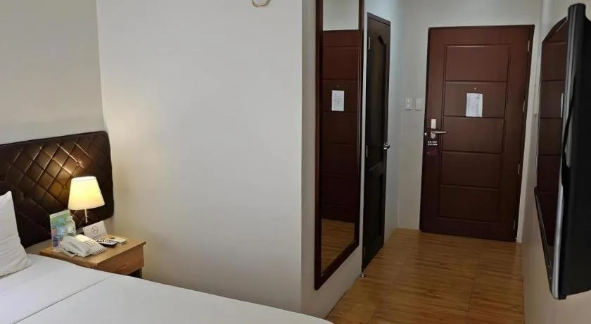 Bed in Capitol Central Hotel and Suites