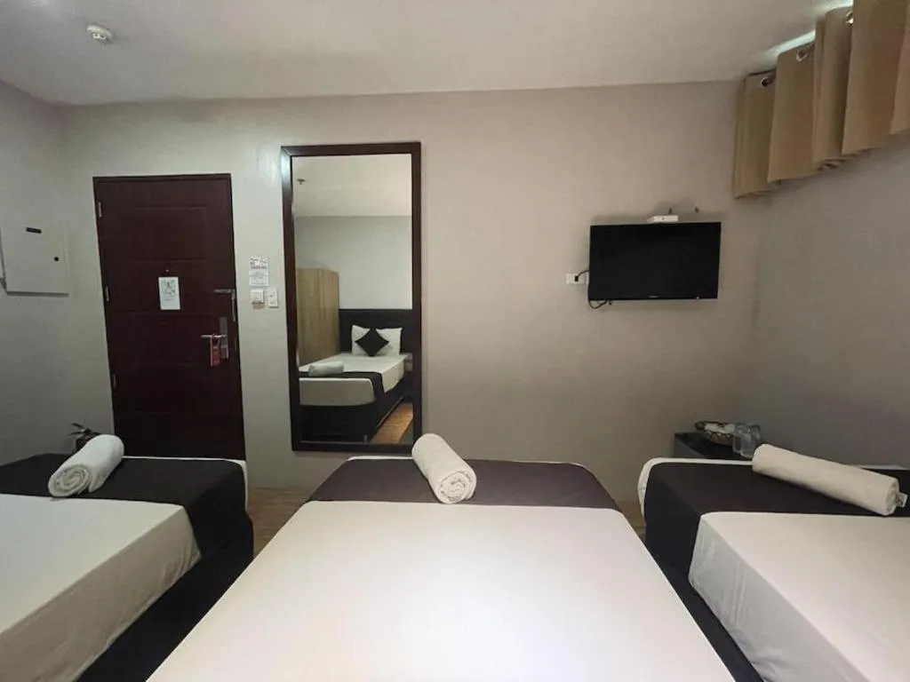 Bed in Capitol Central Hotel and Suites