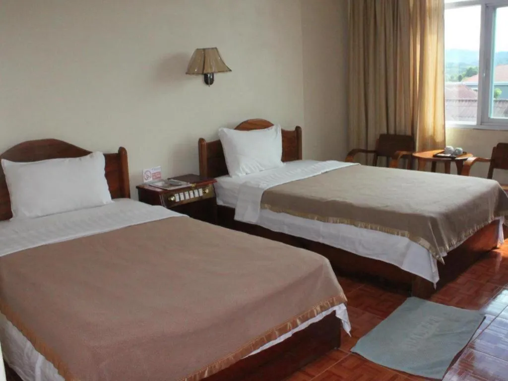 Bed in Dokchampa Hotel