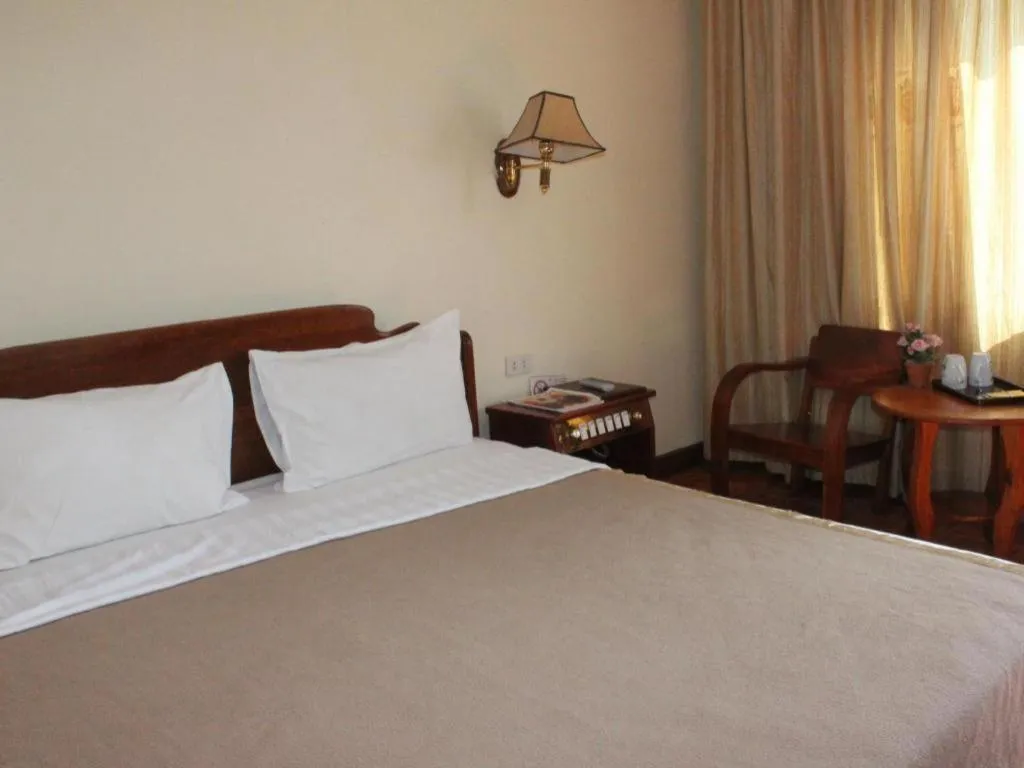 Bed in Dokchampa Hotel