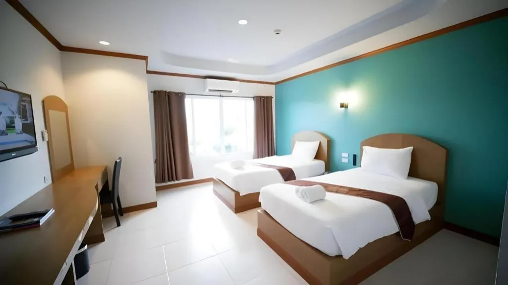 Bed in Thada Chateau Hotel