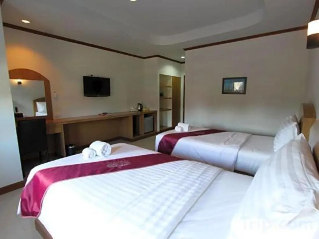 Bed in Thada Chateau Hotel