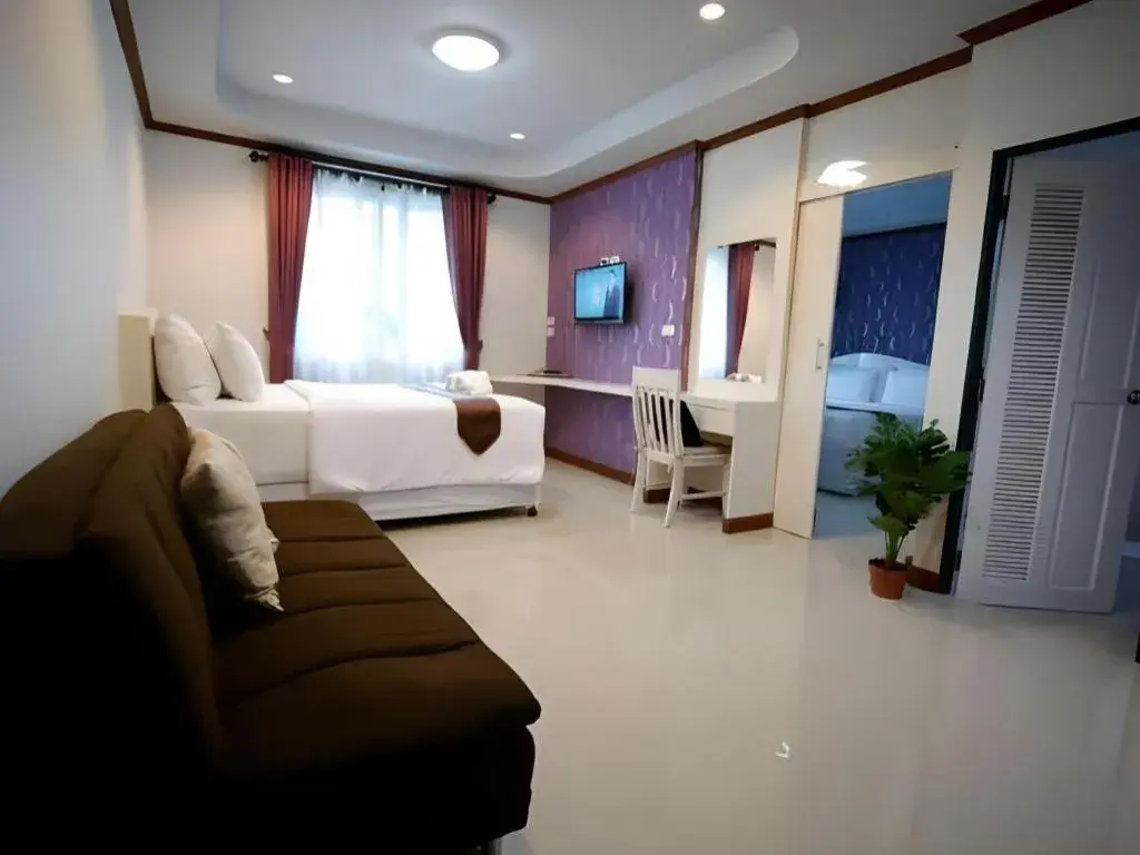 Bed in Thada Chateau Hotel Bed in Thada Chateau Hotel