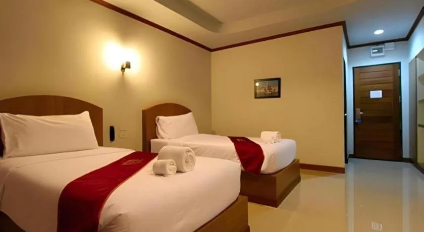 Bed in Thada Chateau Hotel