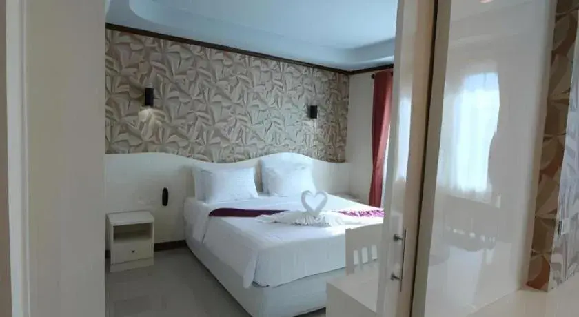 Bed in Thada Chateau Hotel Bed in Thada Chateau Hotel