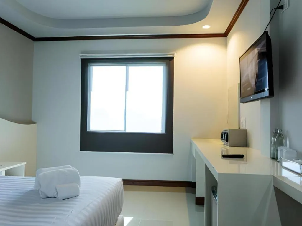 Bed in Thada Chateau Hotel