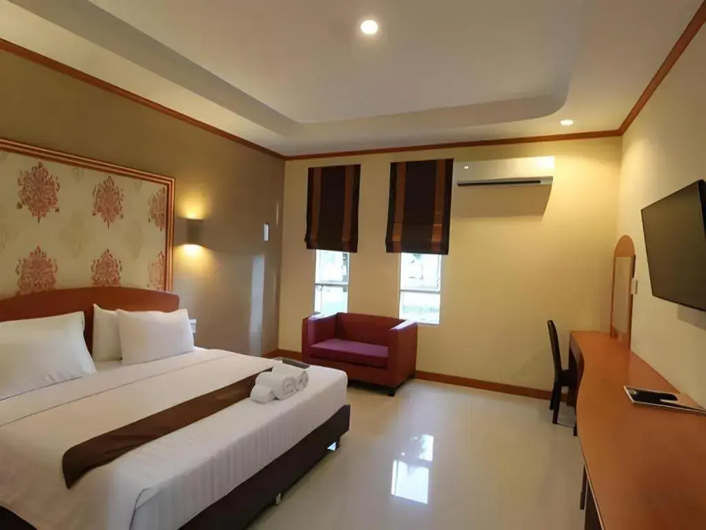 Bed in Thada Chateau Hotel Bed in Thada Chateau Hotel