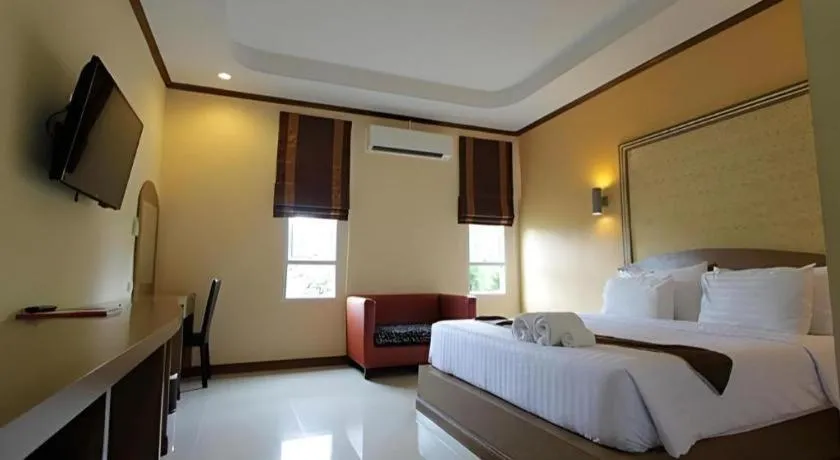 Bed in Thada Chateau Hotel