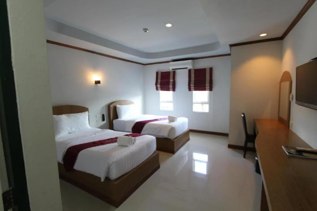 Bed in Thada Chateau Hotel