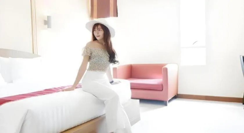 Bed in Thada Chateau Hotel