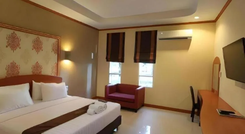 Bed in Thada Chateau Hotel