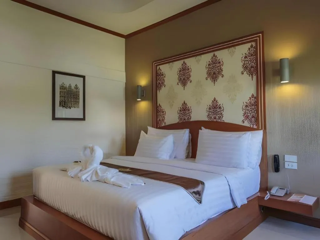 Bed in Thada Chateau Hotel