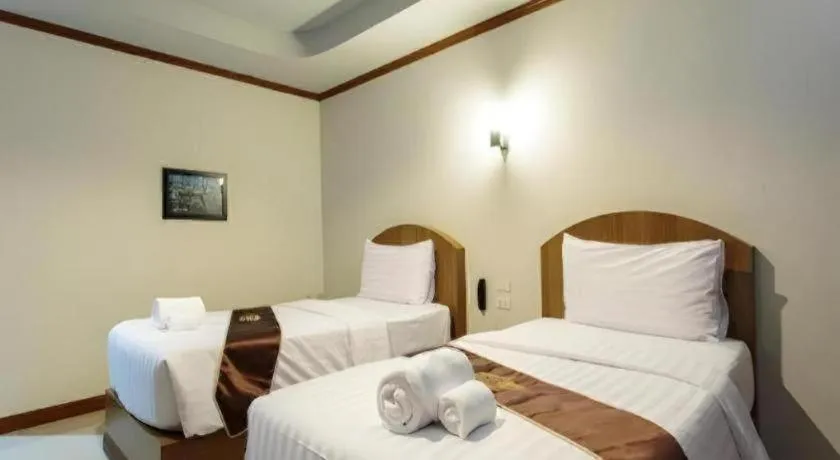 Bed in Thada Chateau Hotel